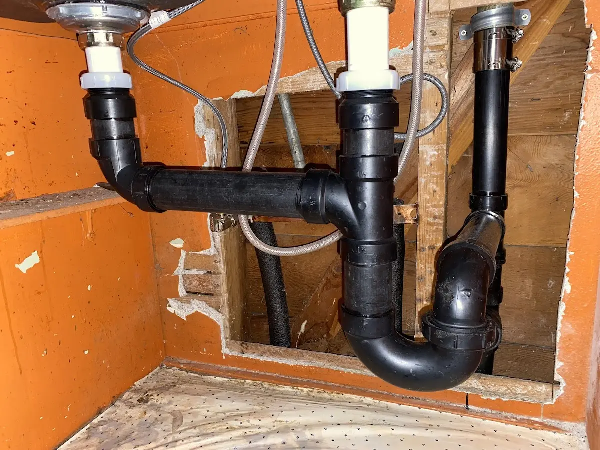 Professional Garbage Disposal Repair equipment and tools on the job in Maitland